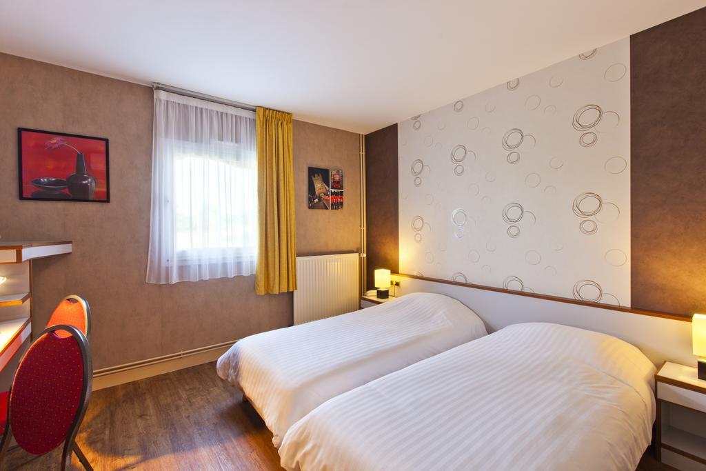 Cit'Hotel Du Circuit มันญีกูร์ ภายนอก รูปภาพ